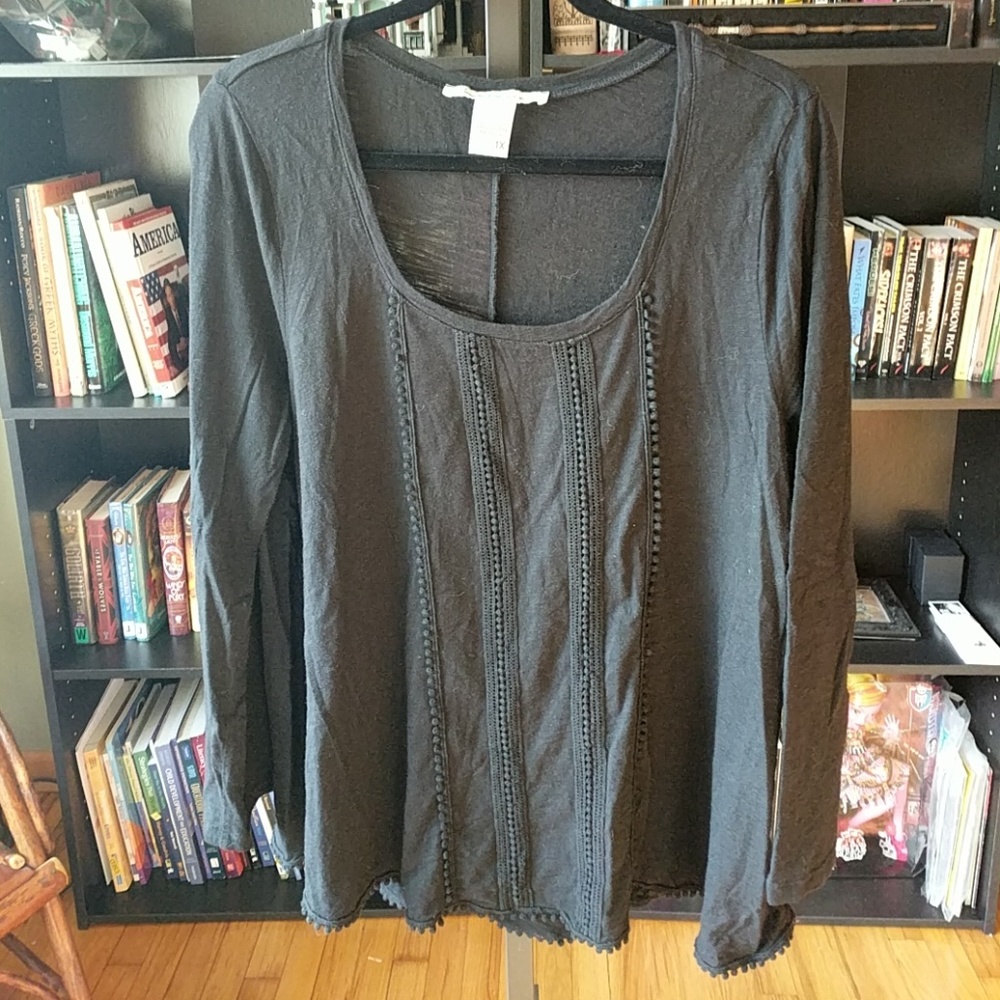 Black long sleeved top with pom-pom detail